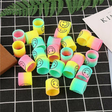 Load image into Gallery viewer, 12 or 24 Slinky Smiley Mini Springs Pinata Party Bag Fillers Wedding Kids Toys
